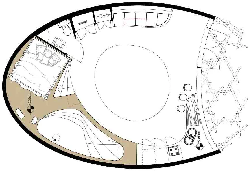 Preliminary floor plan of the guesthouse showing an oval outline with living spaces arranged around a central skylight