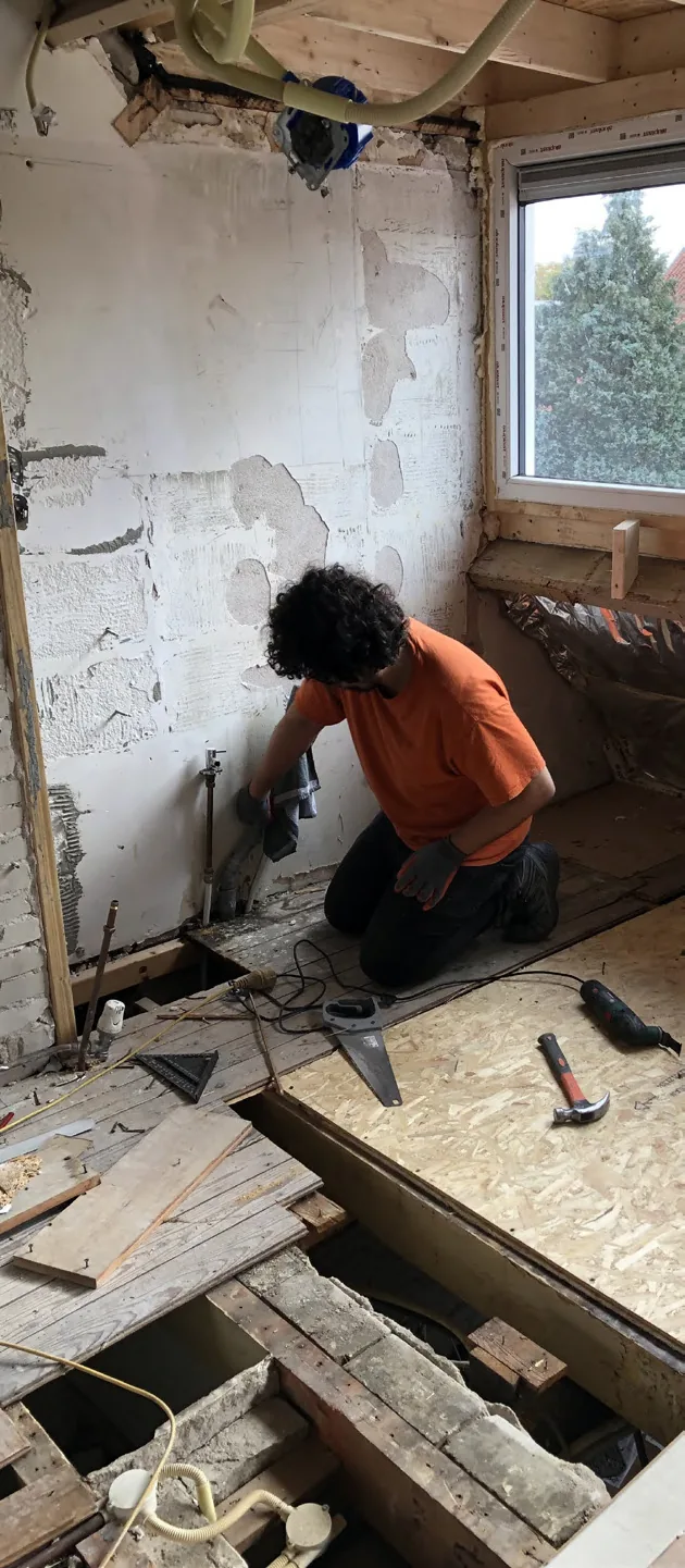 Interior stripped back to bare walls and floor joists during the renovation